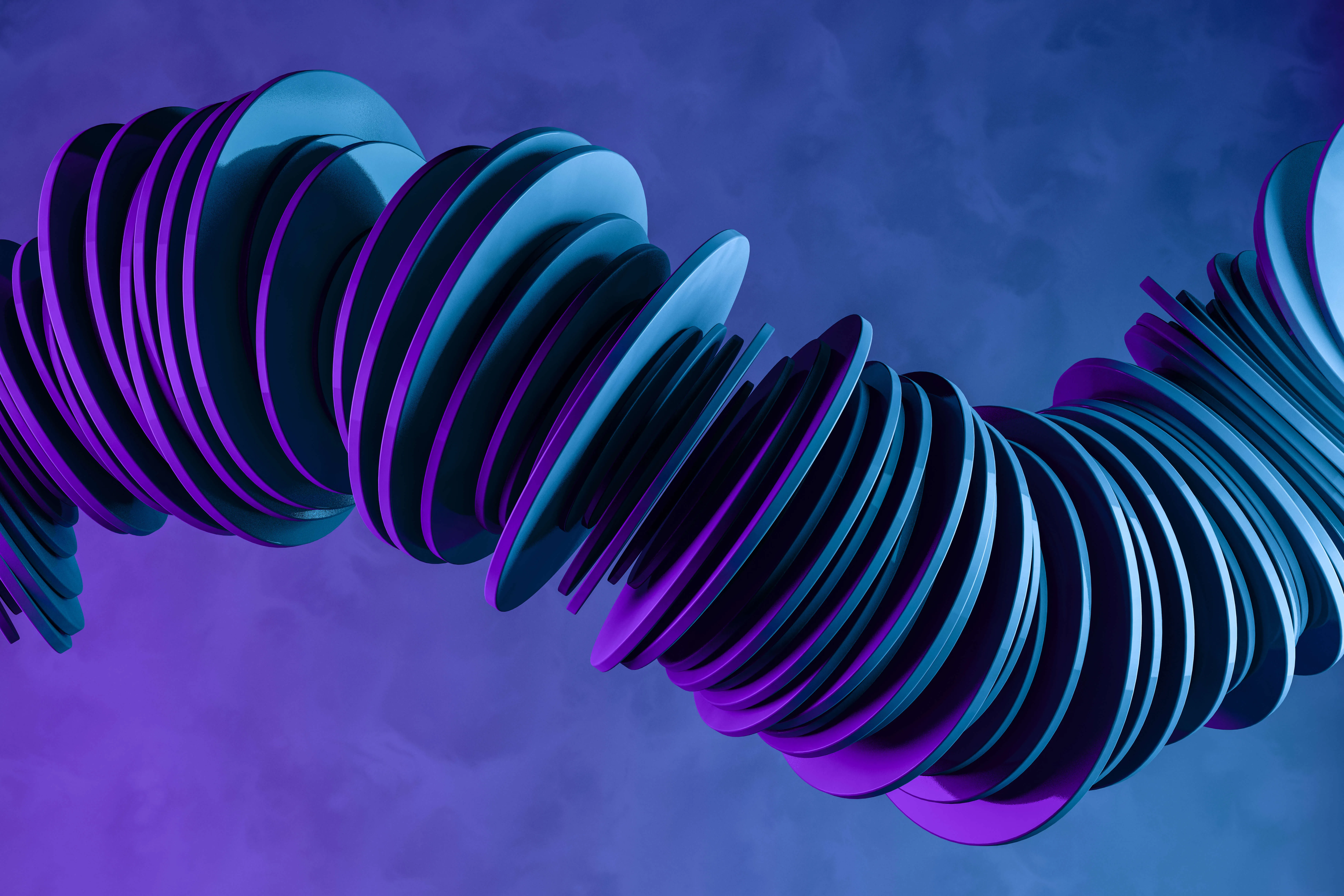 Abstract 3D digital artwork showing a twisted, spiraling stack of blue and purple discs against a gradient blue to purple background.