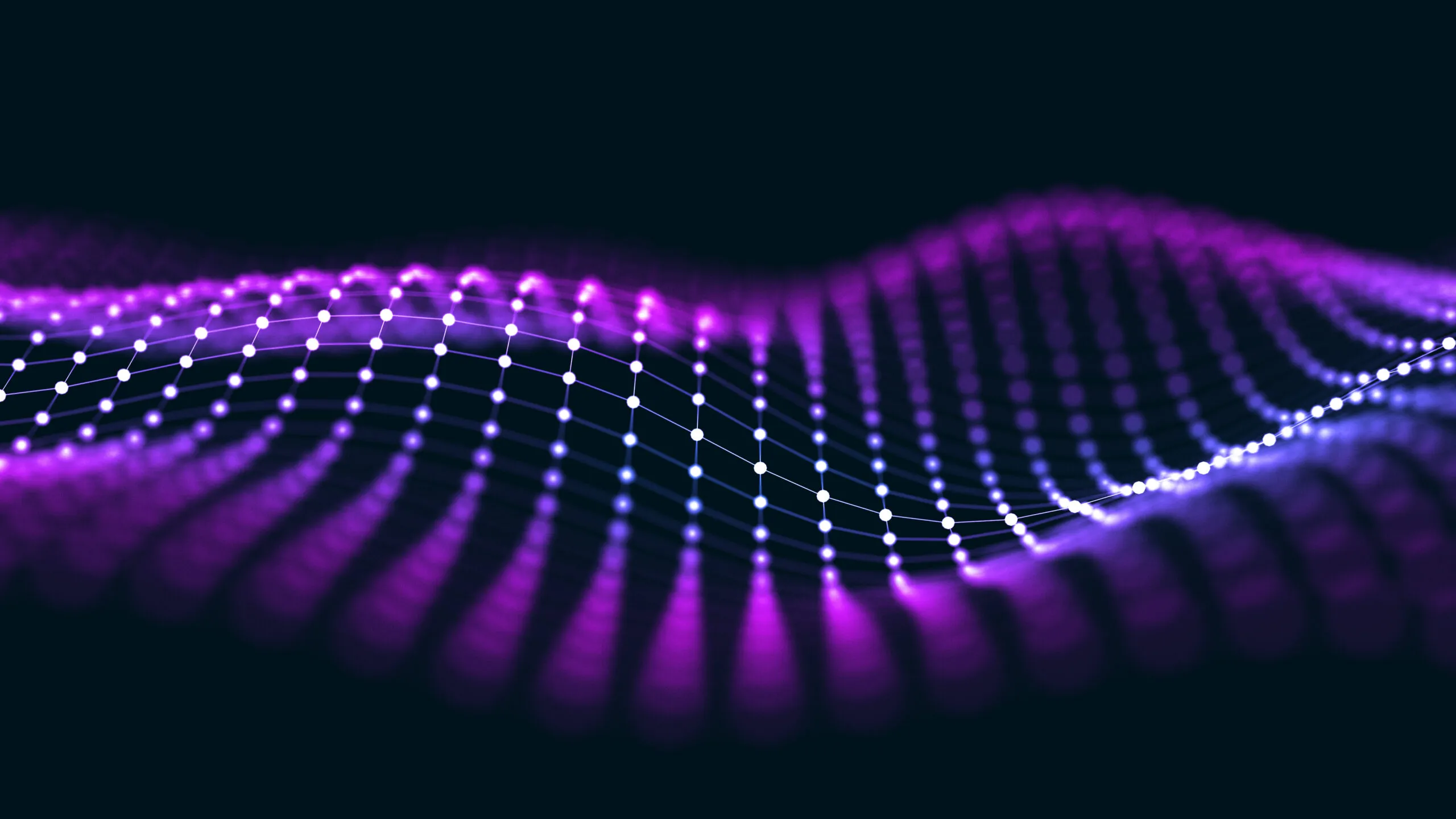 3D wave grid with glowing purple dots connected by lines creating a dynamic mesh pattern on a dark background.