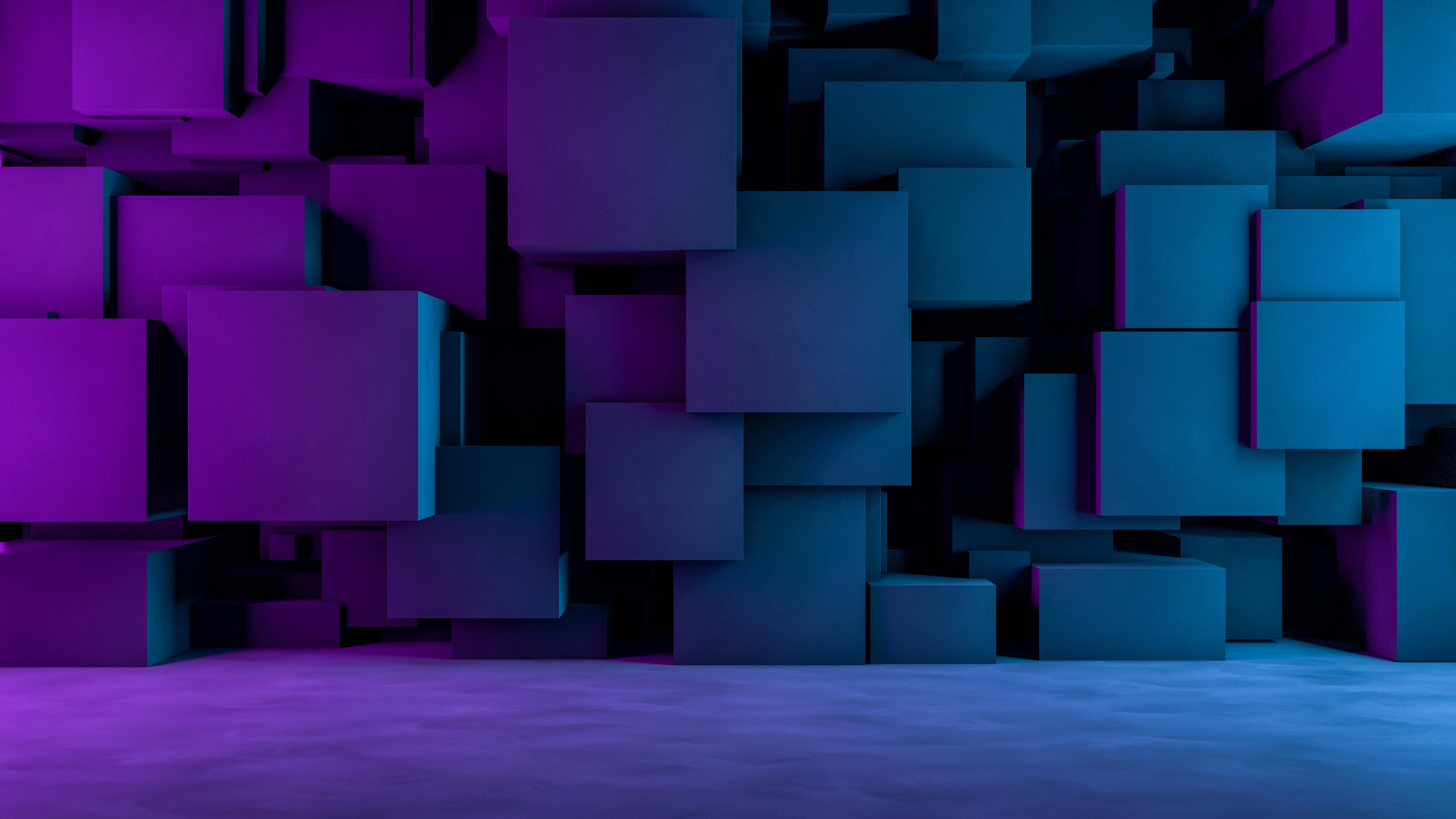 3D abstract arrangement of various-sized cubes in shades of blue and purple stacked and overlapping against a smooth surface.