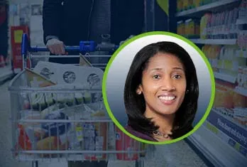 Shopper pushing a shopping cart down a grocery store aisle filled with products, with an inset circular portrait of a smiling woman with shoulder-length hair.