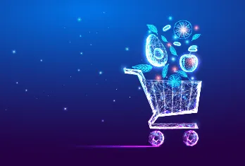 Digital wireframe shopping cart with floating digital fruits above it on a blue background with glowing light effects.