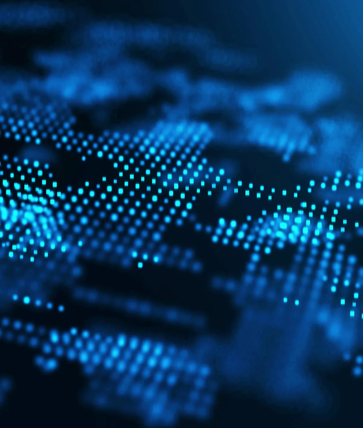 Close-up of a digital blue grid composed of glowing square dots on a dark background, creating an abstract futuristic pattern.
