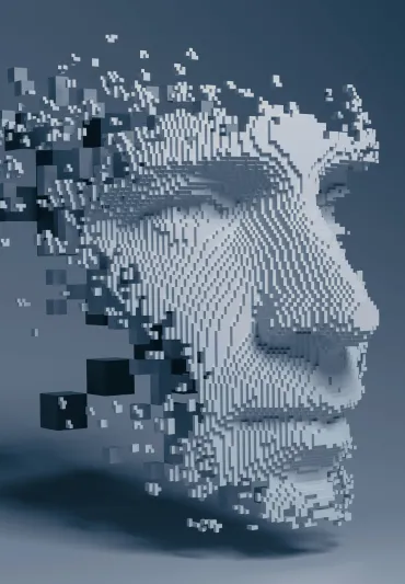 A digitally constructed human face made of numerous small 3D cubes, partially disintegrating and floating apart against a gray background, symbolizing artificial intelligence or digital transformation.