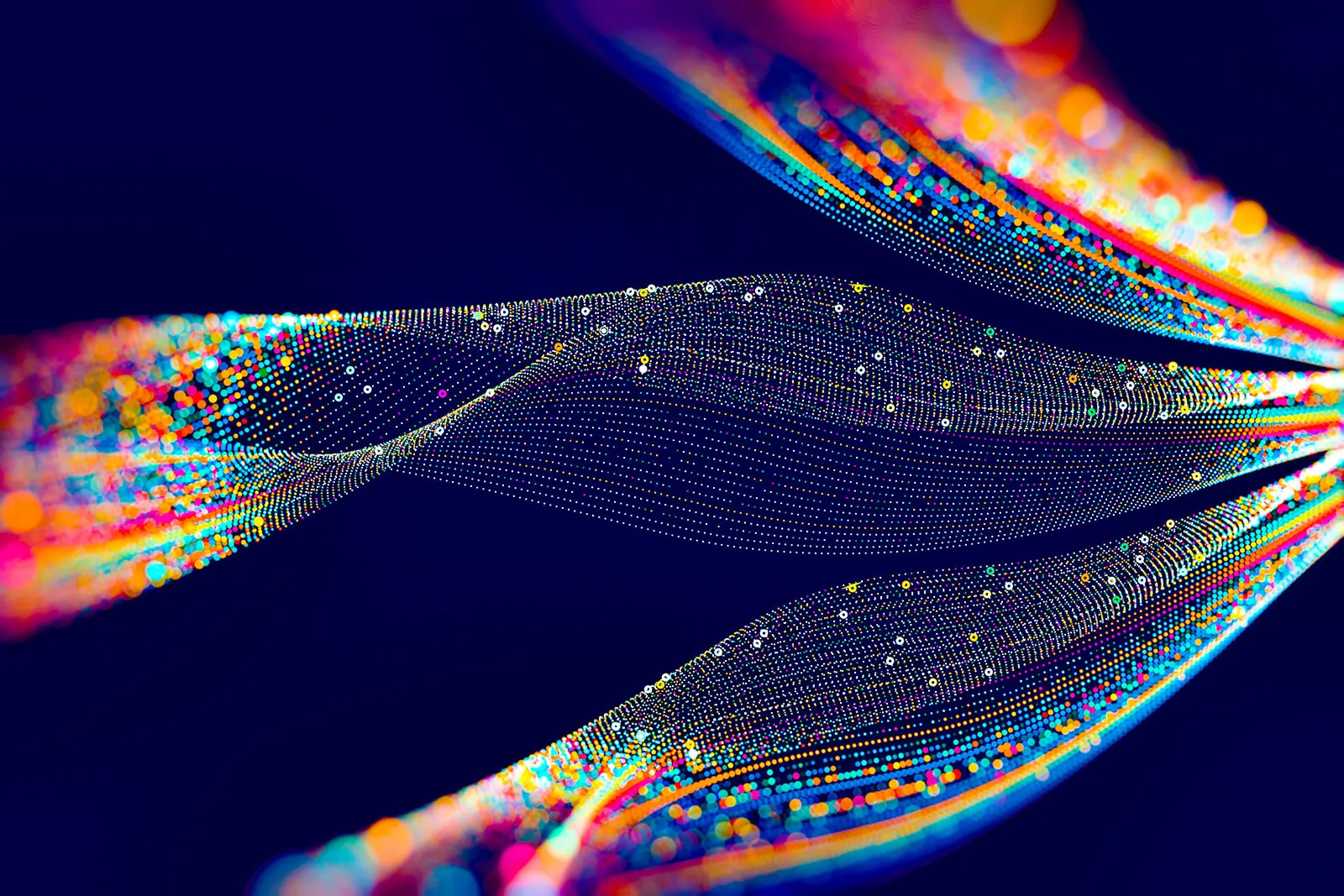Colorful digital wave-like patterns composed of numerous small glowing dots and circles in blue, orange, yellow, pink, and white on a dark blue background.