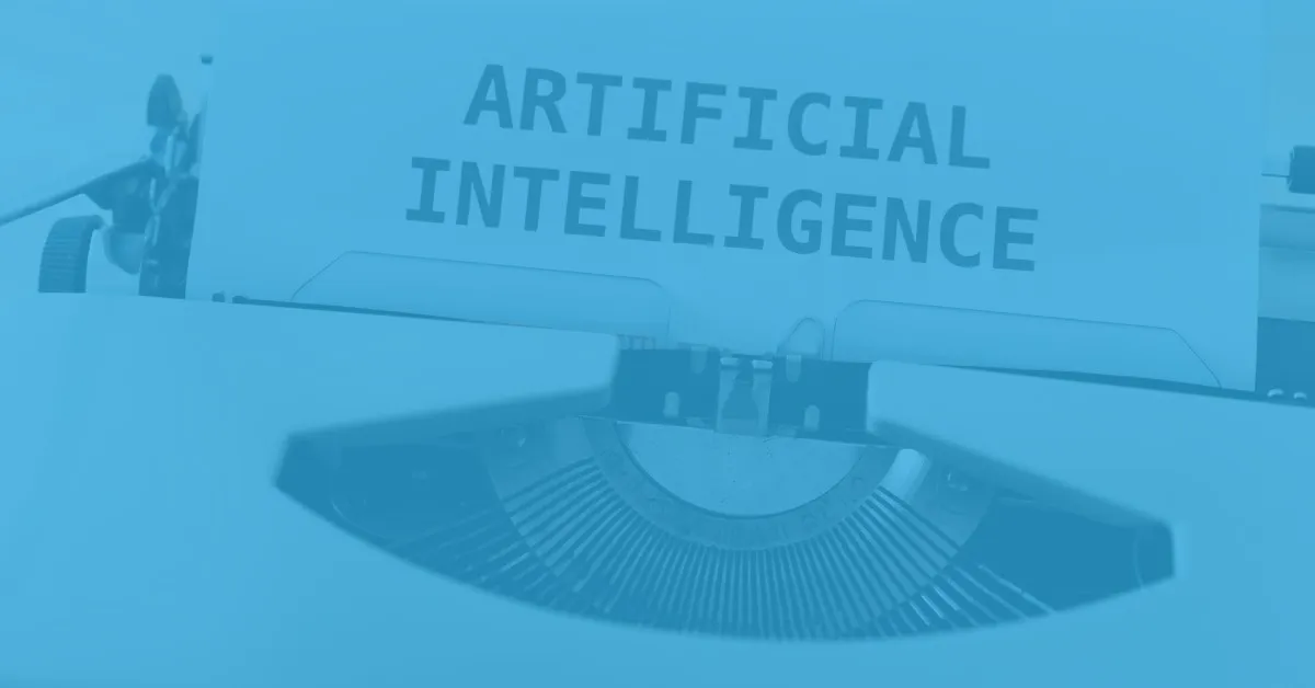 Close-up of a typewriter with a paper sheet displaying the words 'ARTIFICIAL INTELLIGENCE' in uppercase letters.