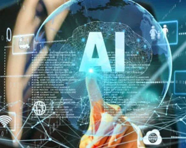 A person points with a finger toward a glowing holographic interface displaying the letters 'AI' over a digital brain and globe, surrounded by various technology and network icons.