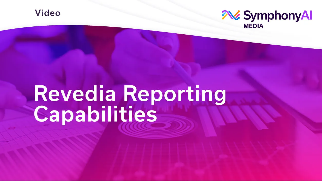 Title card with a purple overlay showing two hands pointing at various charts and graphs on paper and a tablet, with text reading 'Revedia Reporting Capabilities' and the SymphonyAI Media logo.