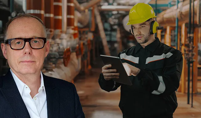 A man in a yellow hard hat and protective ear muffs uses a tablet in an industrial facility with large metal pipes, with a close-up portrait of a man wearing black glasses and a suit superimposed on the left side of the image.