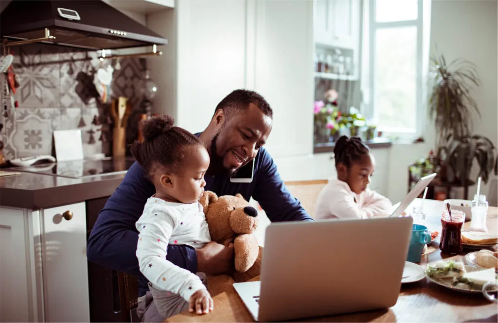 Family on laptops