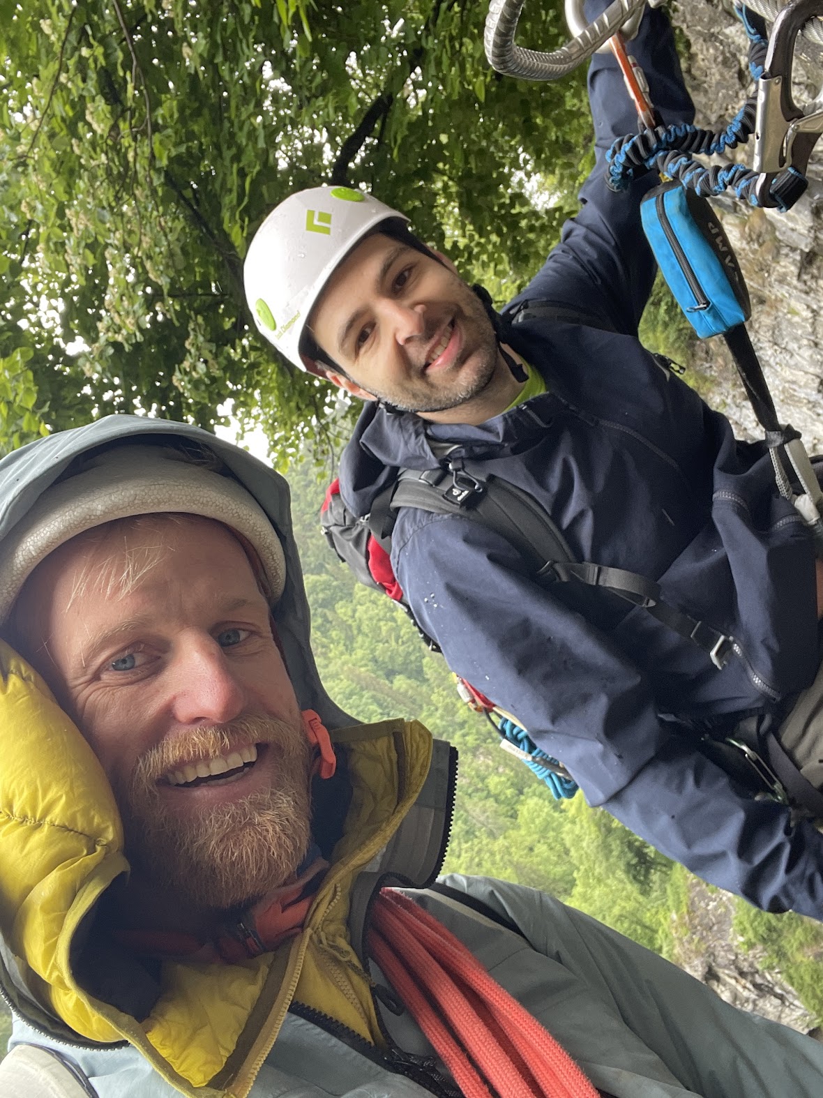 The Saint-Gervais gorge via ferrata route traversing the rocky cliff face above a rushing river