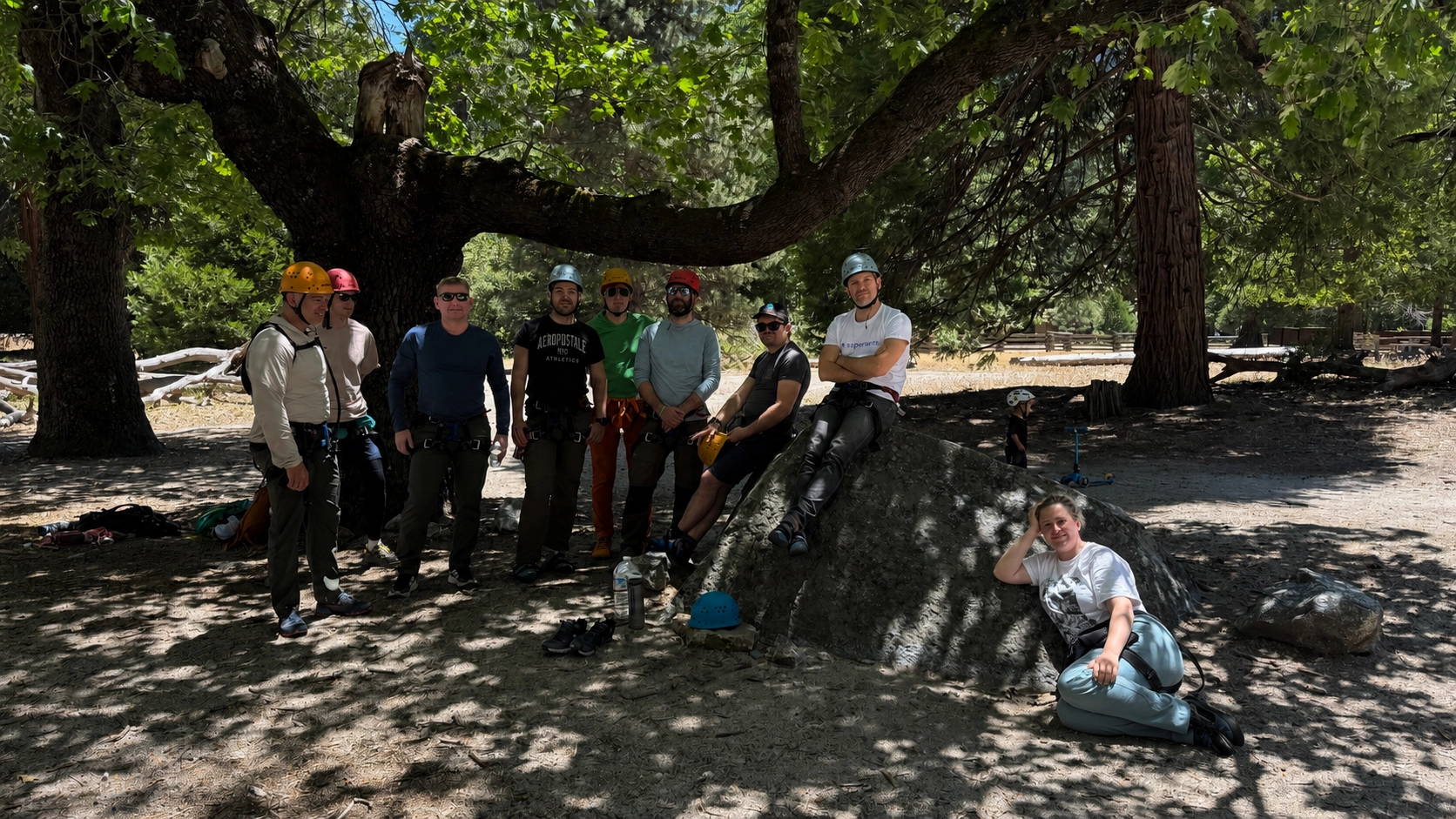 The group resting together after a morning of rock climbing