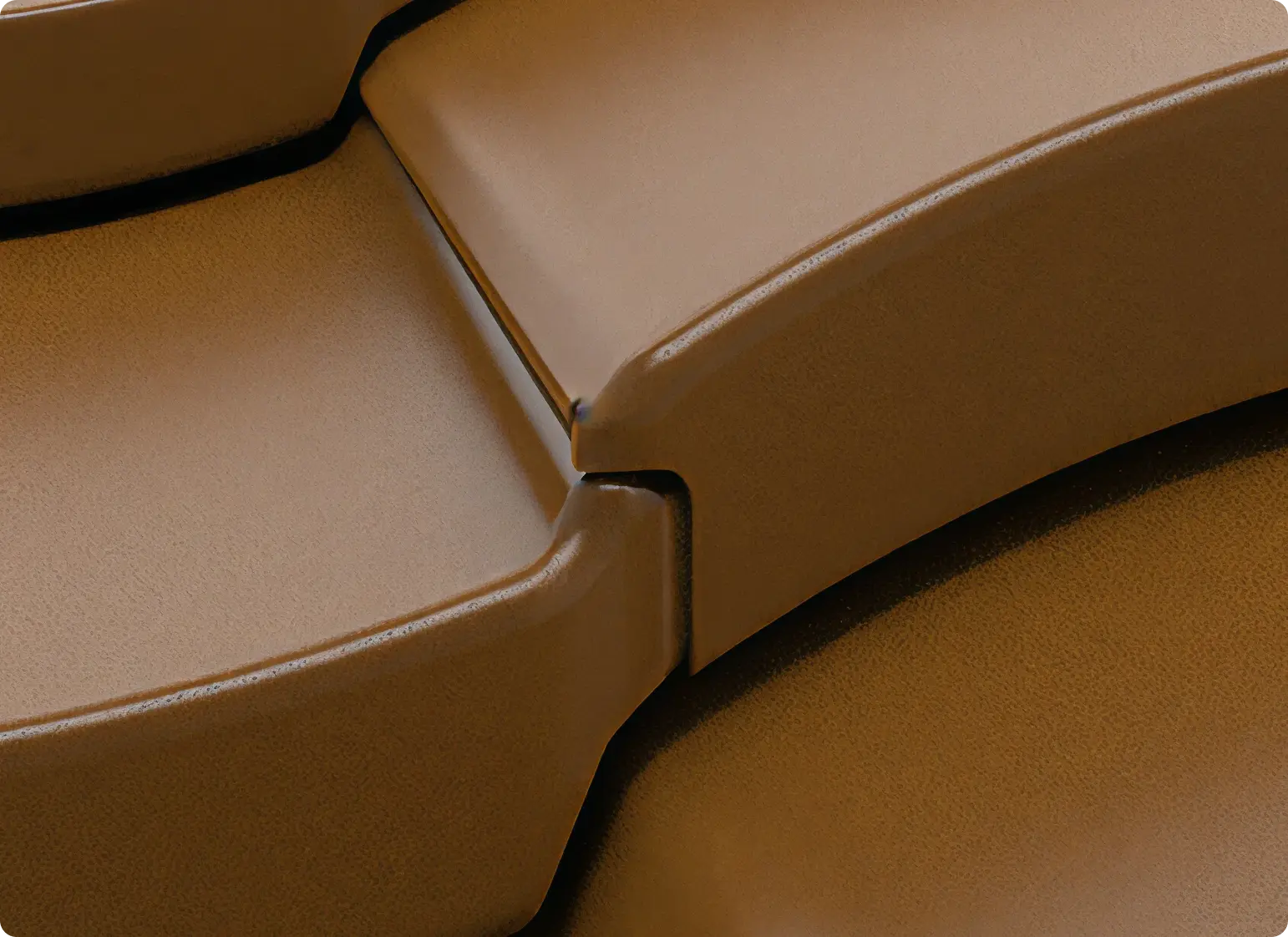 Close-up of interlocking brown plastic pieces with textured surfaces.