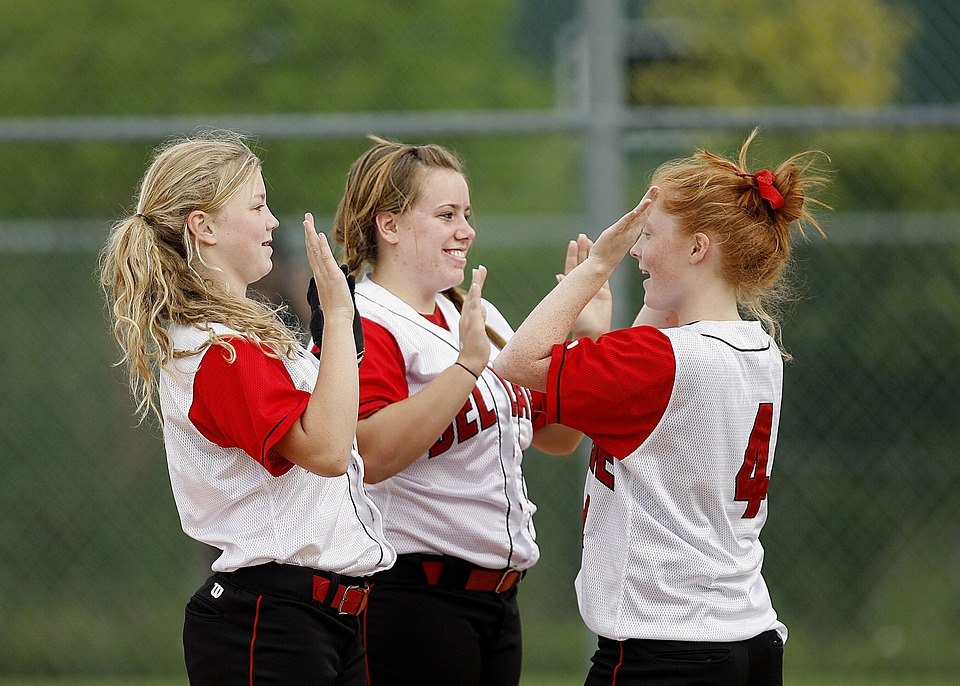 Social benefits of youth sports - softball girls team