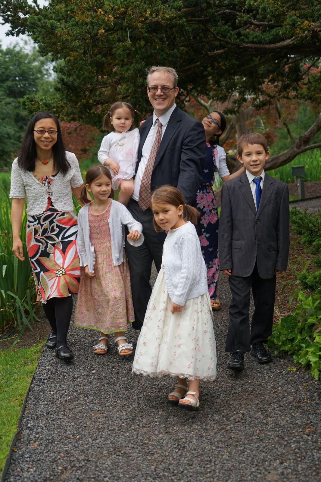 The Loy family smiling together