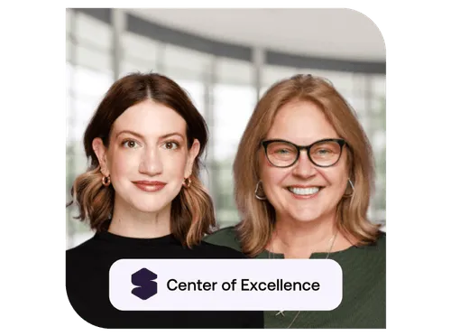 Two women smiling in an office setting, with text overlay reading 'Center of Excellence'.