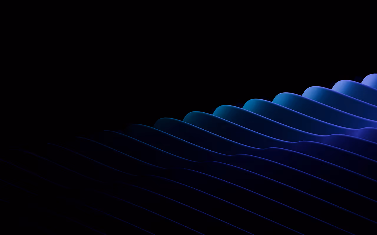 Abstract wave pattern of blue and purple gradients on a black background.