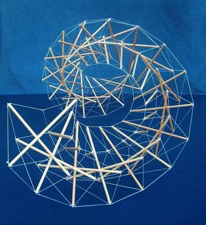 Spiral tensegrity model built from wooden dowels and tensioned string