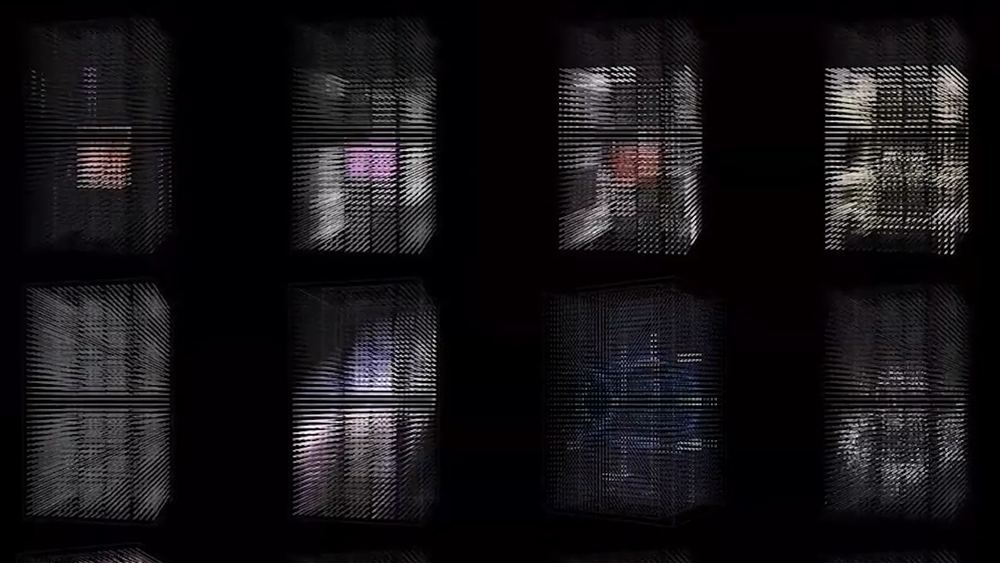 Grid of Hypercube LED panels showing faint imagery in low light