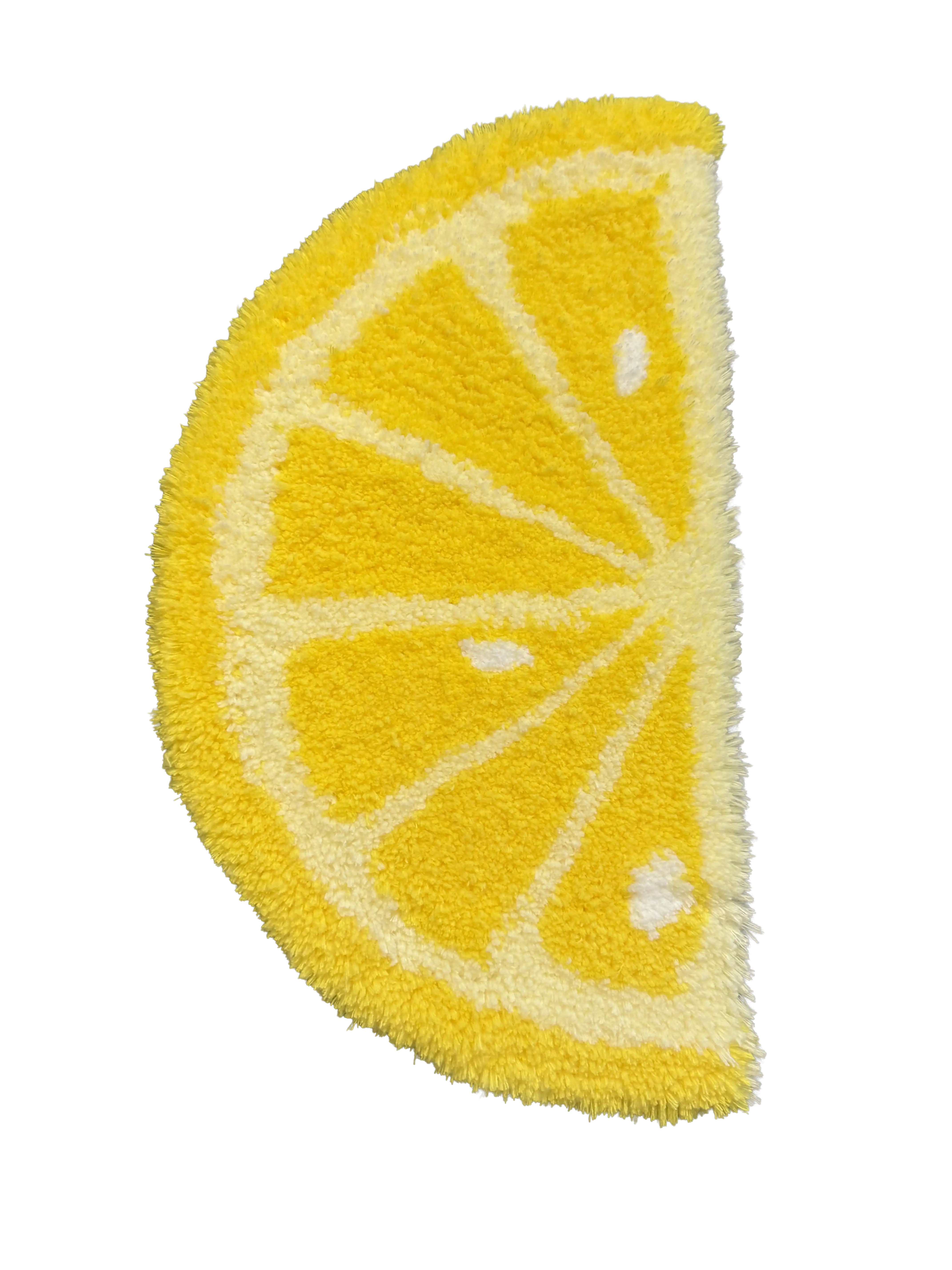Lemon slice shaped tufted rug in yellow, with pith and seed detailing
