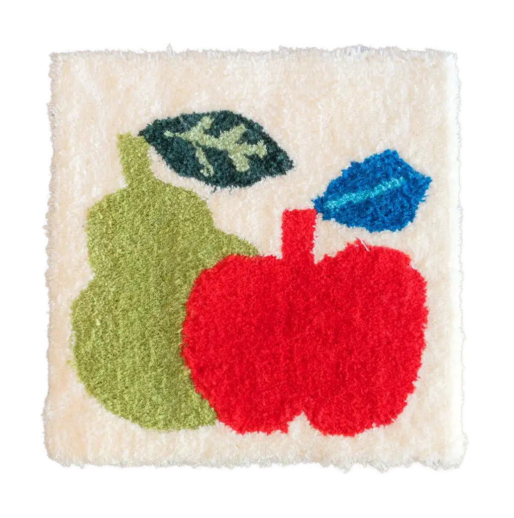 Customer-made cream tufted rug with a red apple, green pear and three colourful leaves