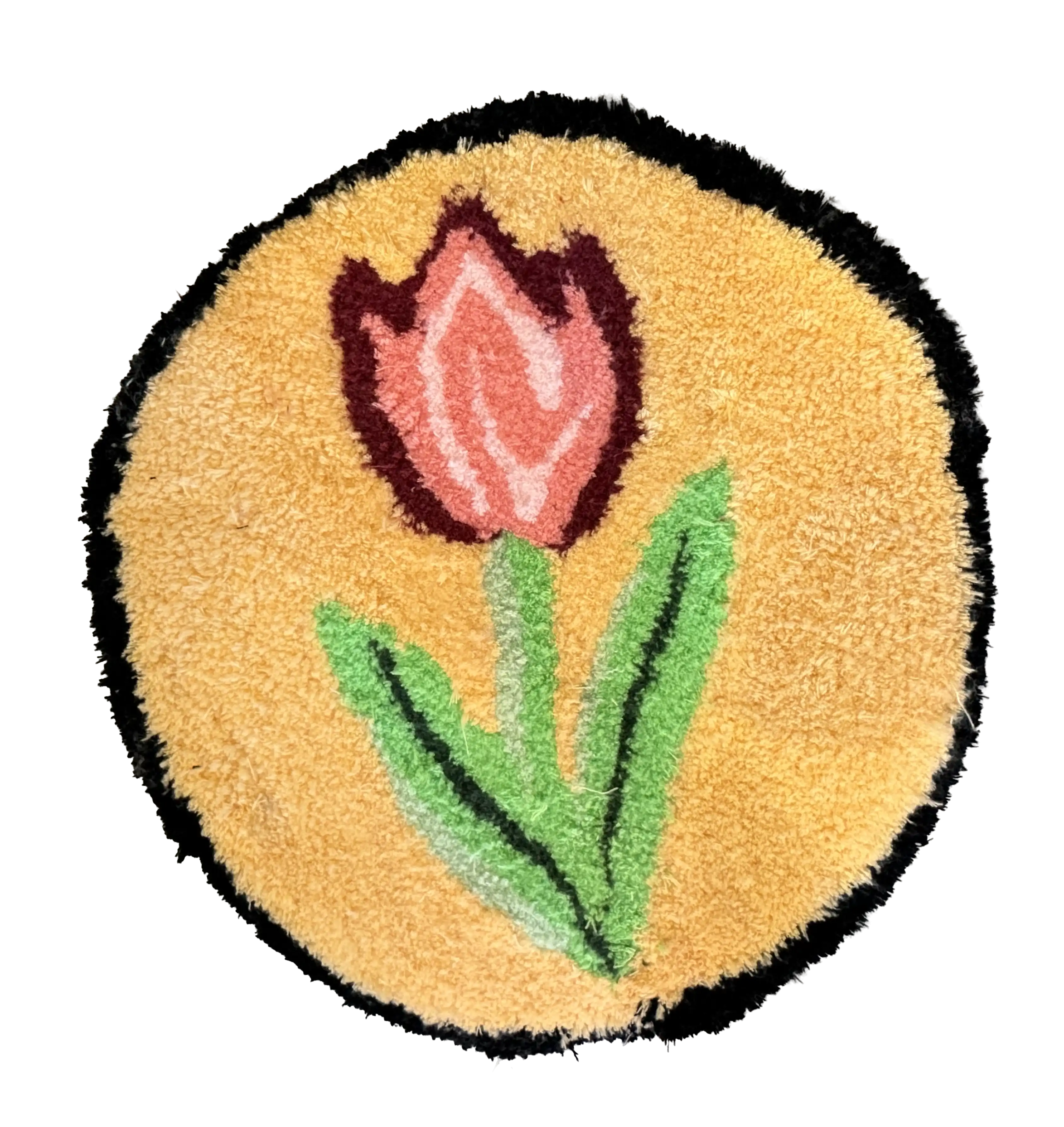 Round tufted rug with a pink tulip, green leaves and a warm golden background