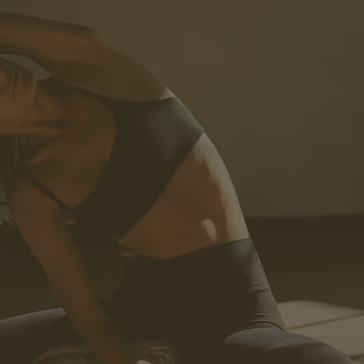 Woman stretching on a mat