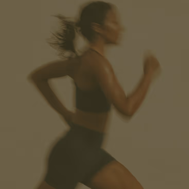 Woman running mid-stride