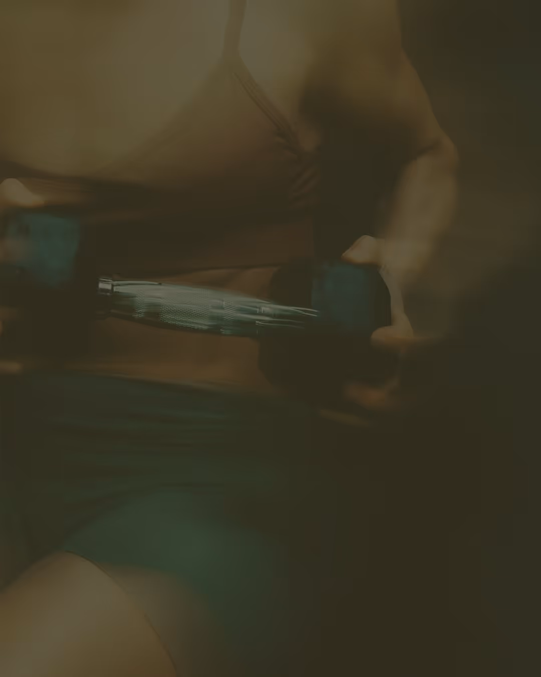 Woman training with dumbbells