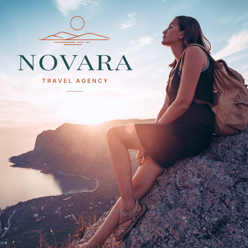 Woman with backpack sitting on rocky cliff overlooking a coastal landscape at sunset.