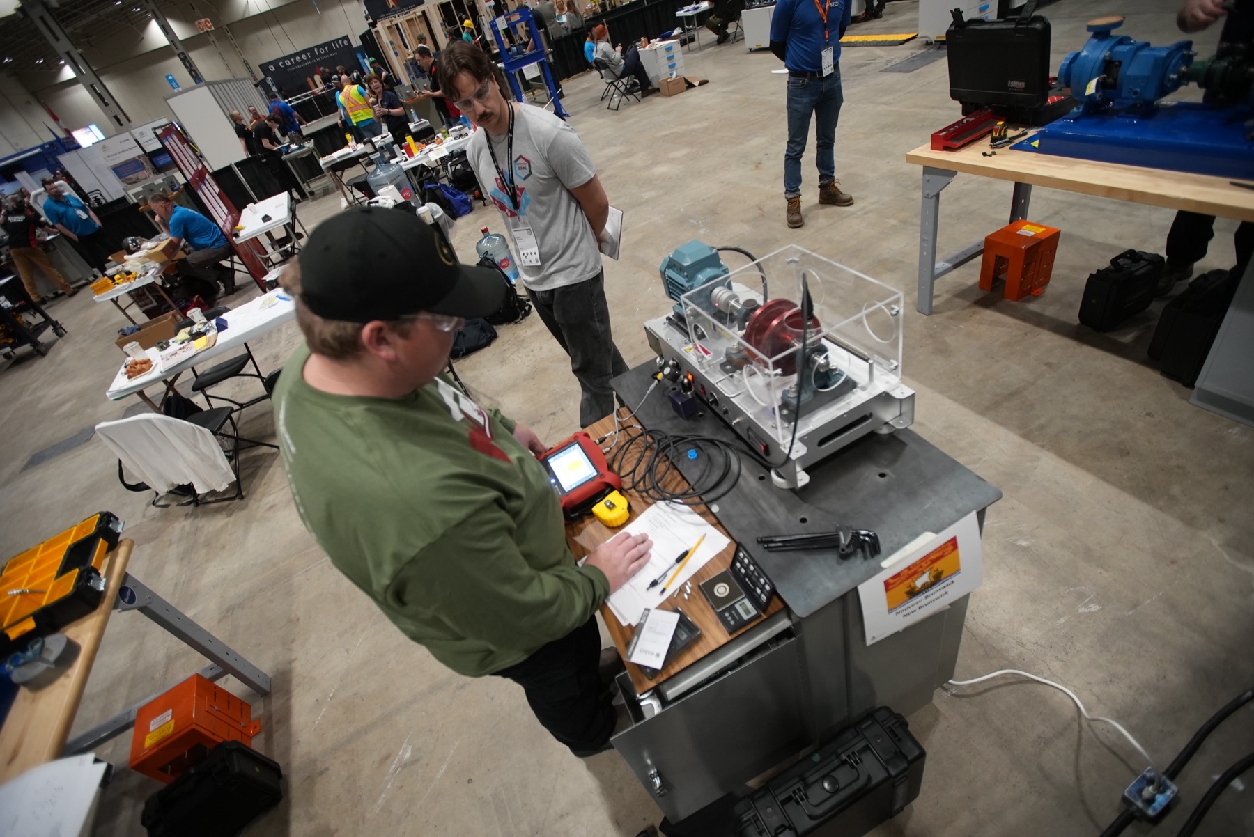 Overhead view of competitor workstations at a skilled trades competition