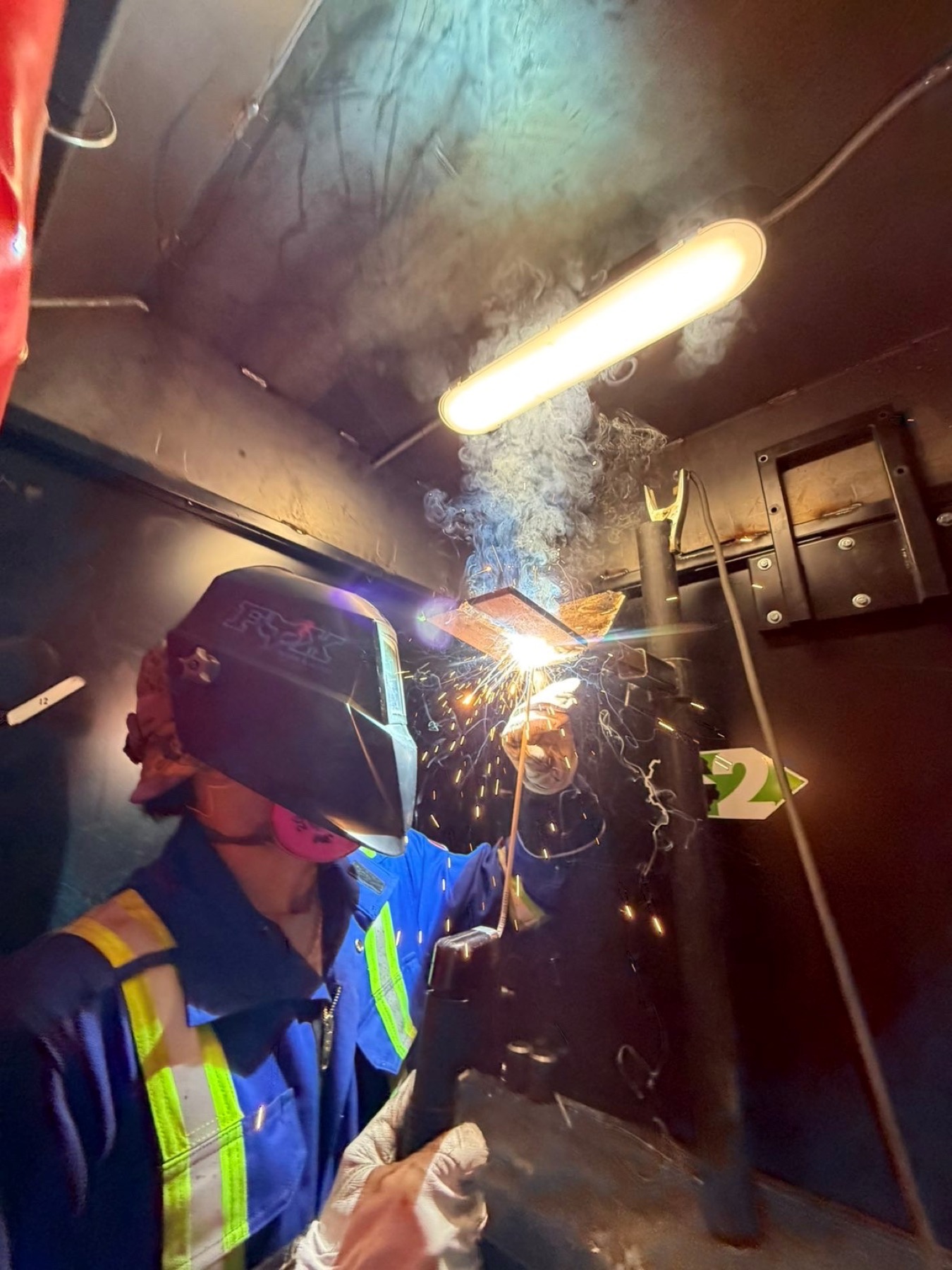 STEP Boilermaker graduate Owen welding