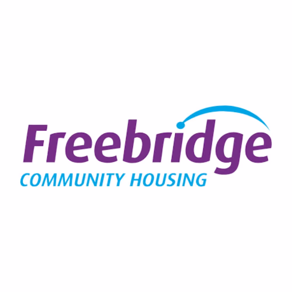 Freebridge Community Housing logo with a blue arc over the text.