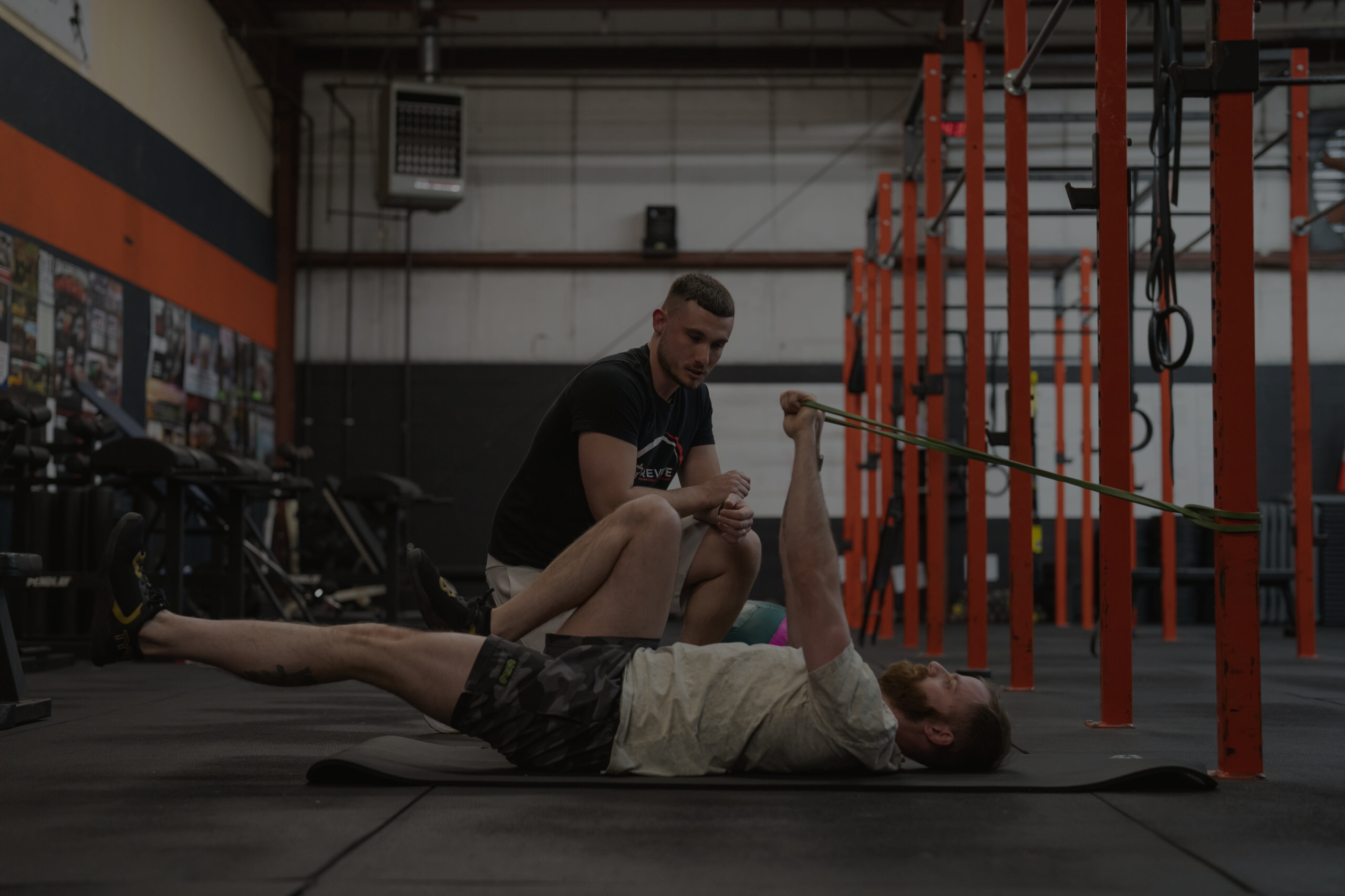 Patient working with a provider at a performance physical therapy clinic in Columbus performing manual therapy