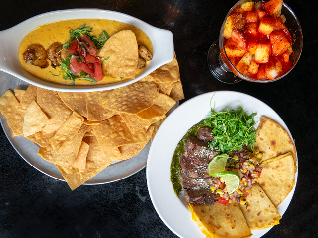 three plates of food on a table