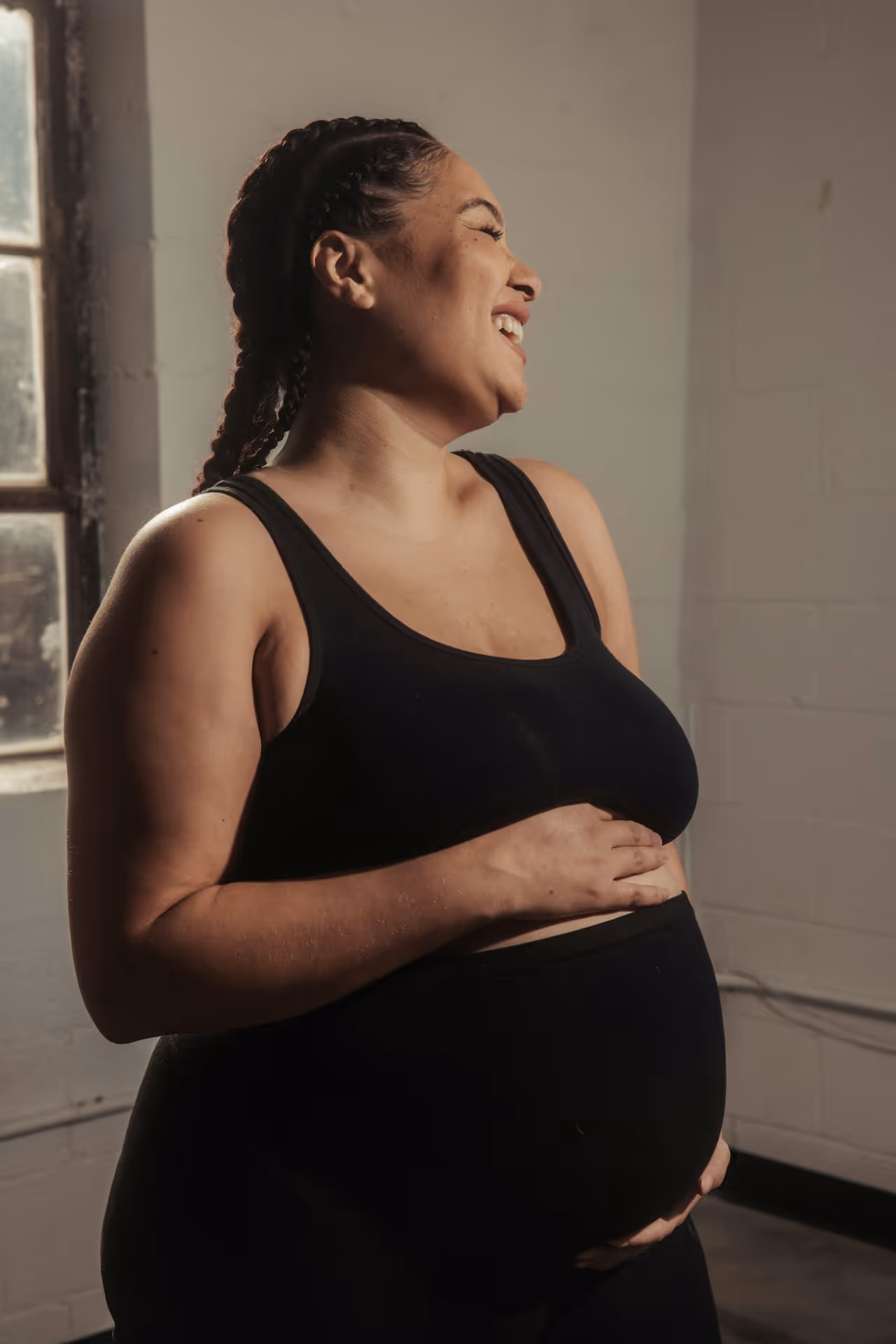 Pregnant woman feeling confident