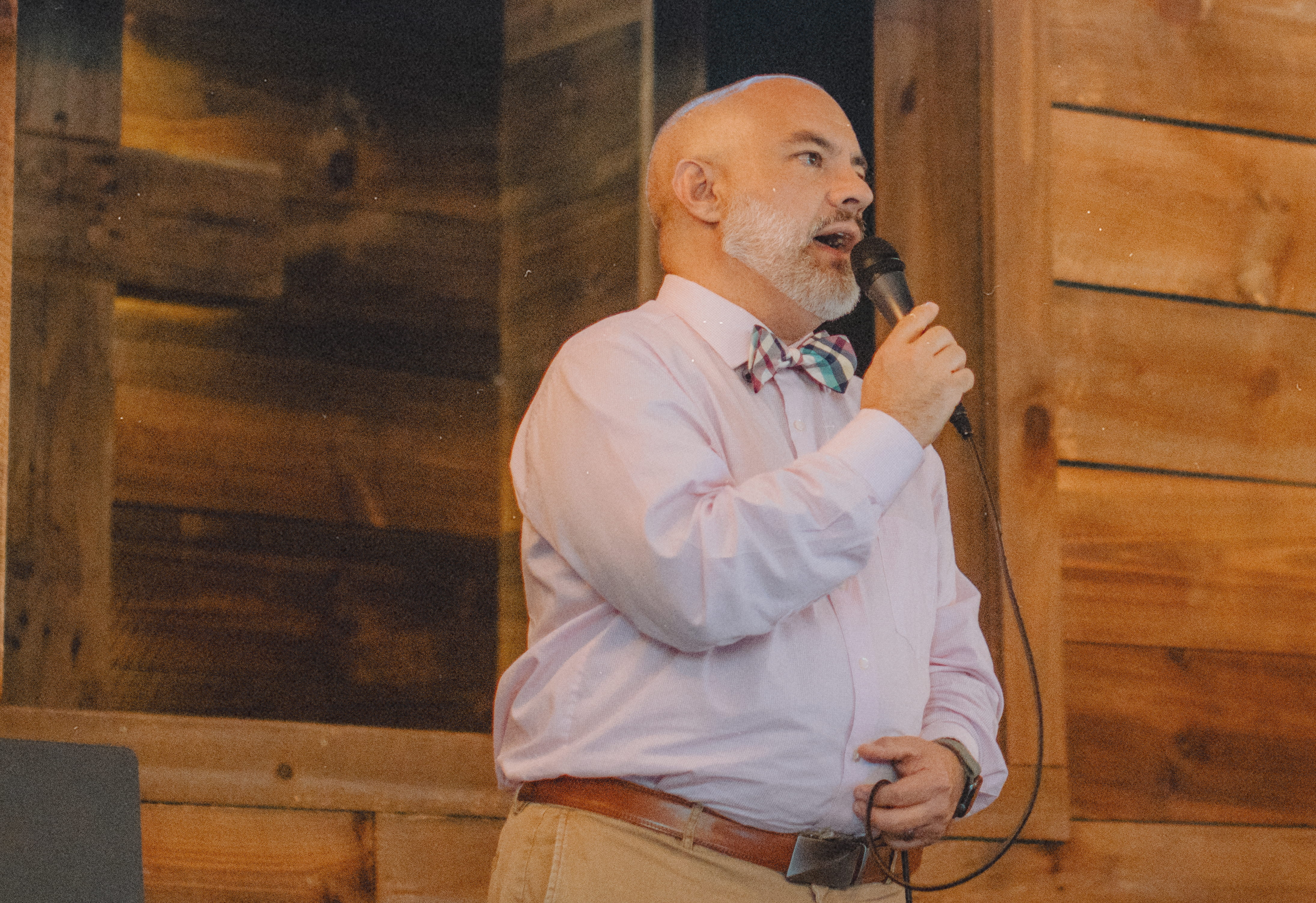 A worship leader singing during a Sunday morning service