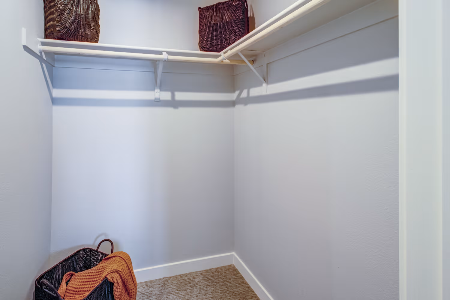 Closet with clothing racks