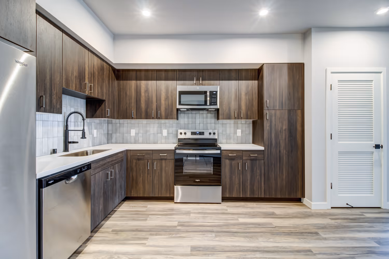 Kitchen with brown cabinets