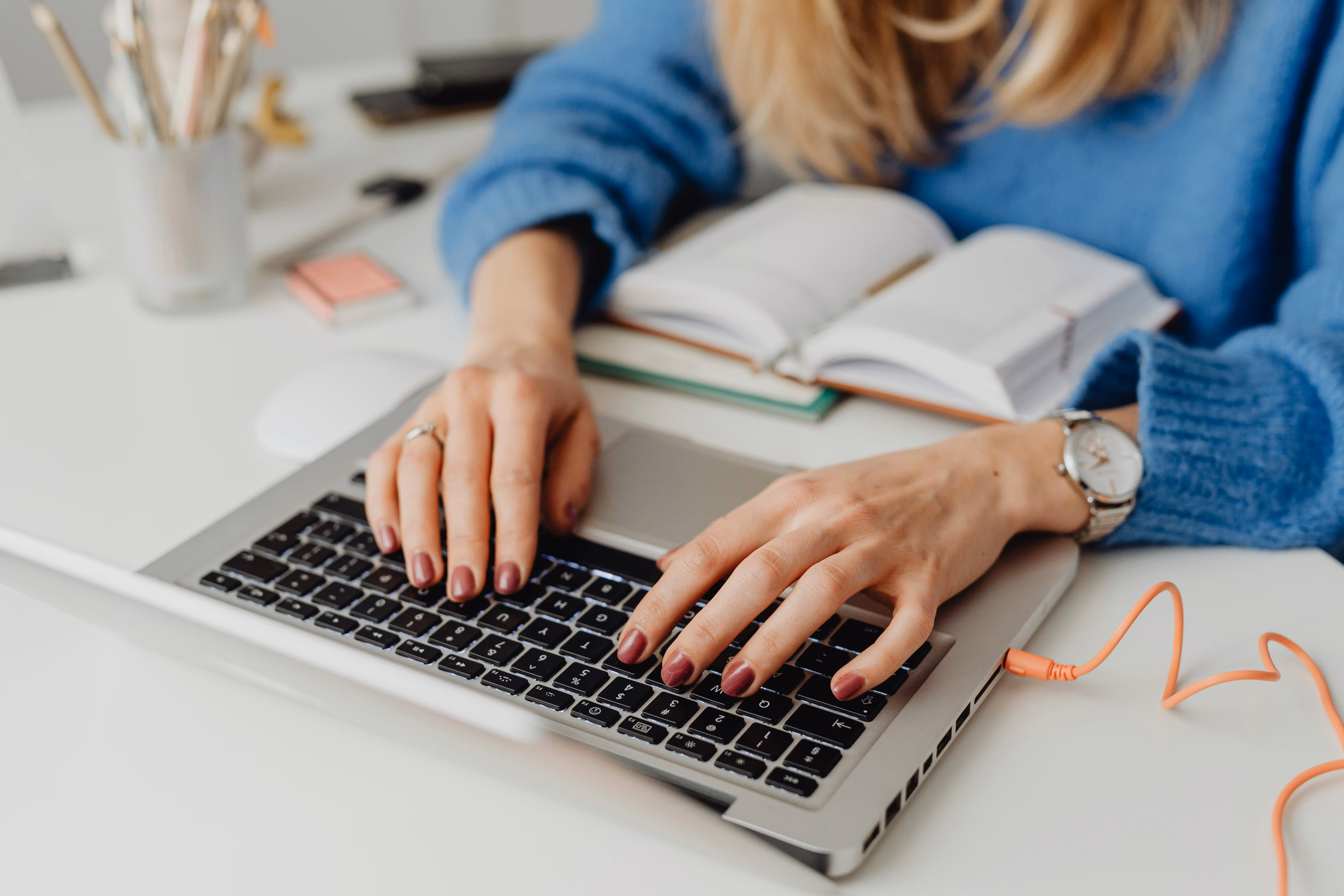 person on computer stock image