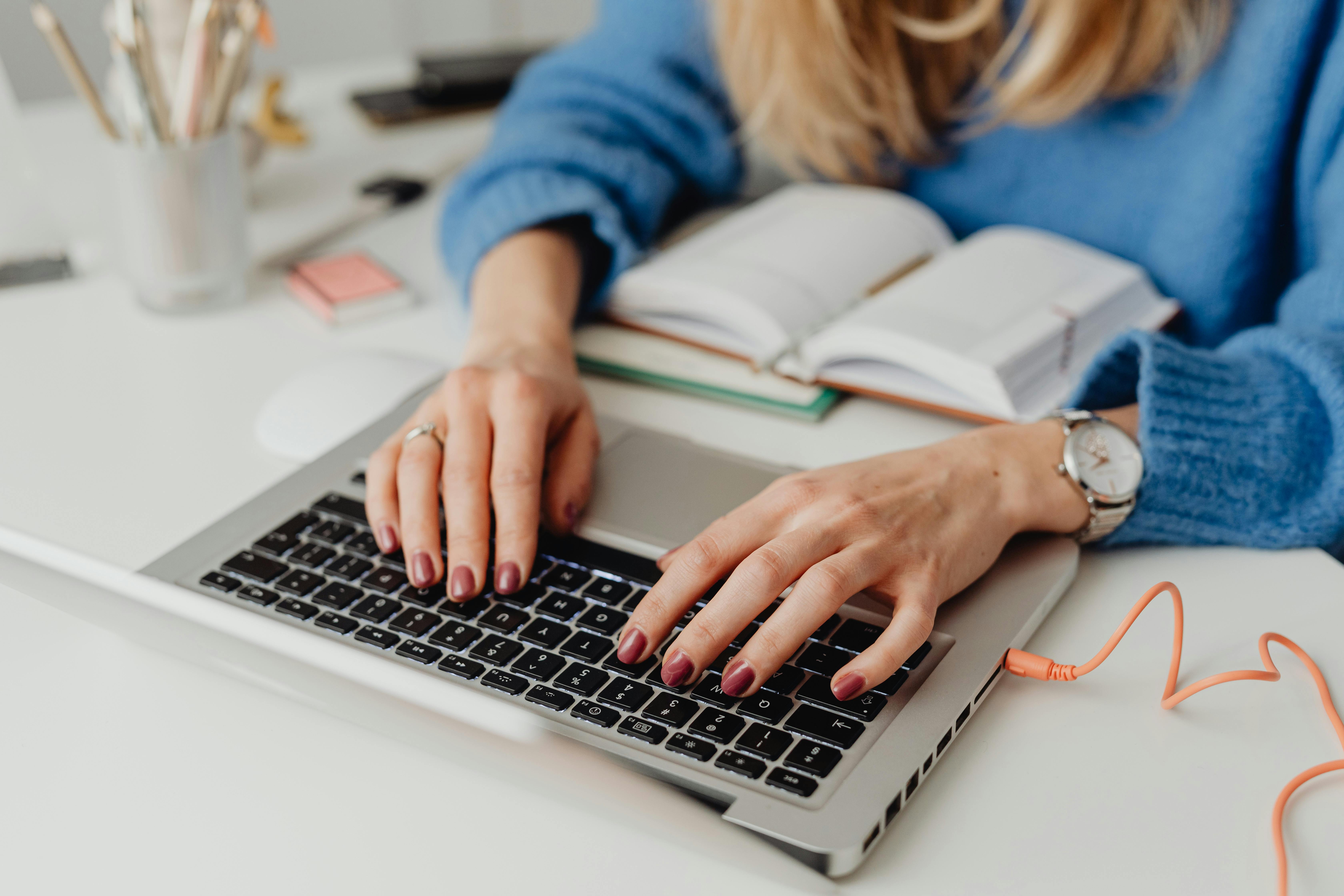 person on computer stock image