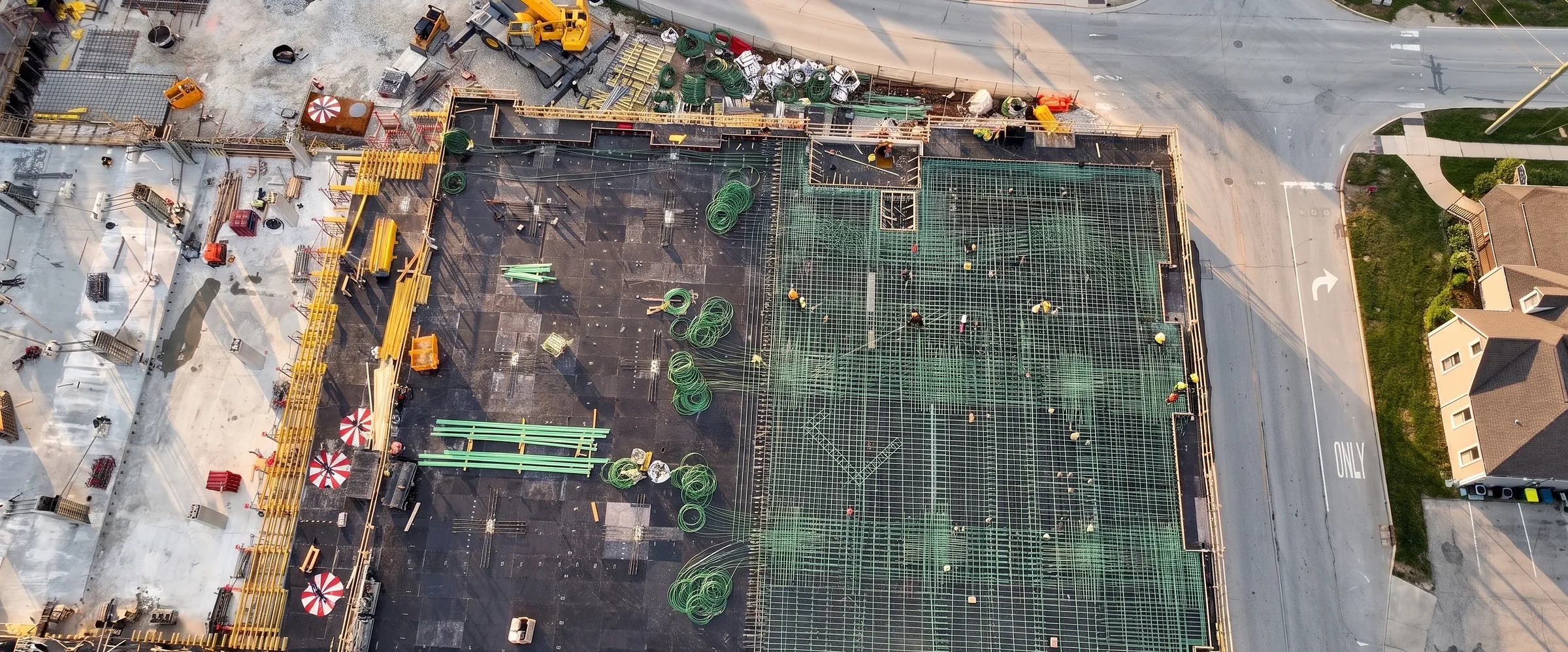 Crews working an elevated deck, seen from above