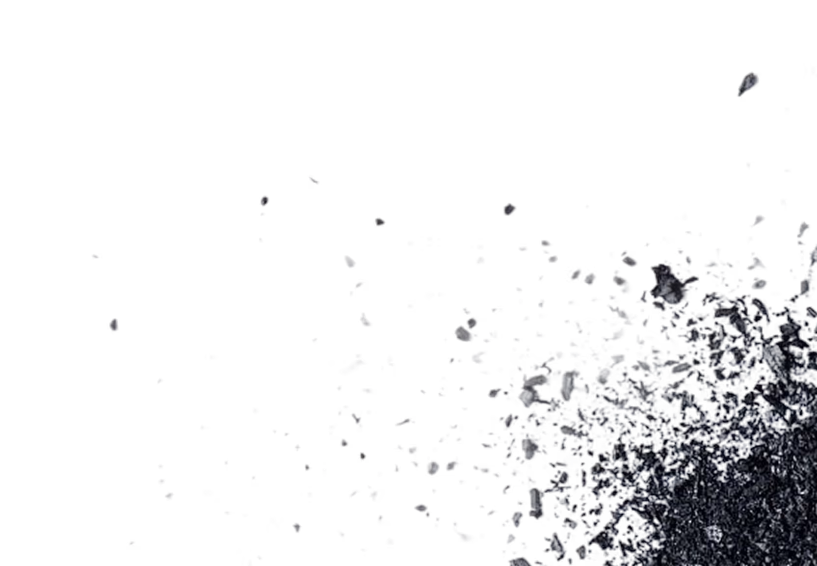 Particles dispersing from a dense cluster on the right into smaller dots scattered towards the left on a black background.