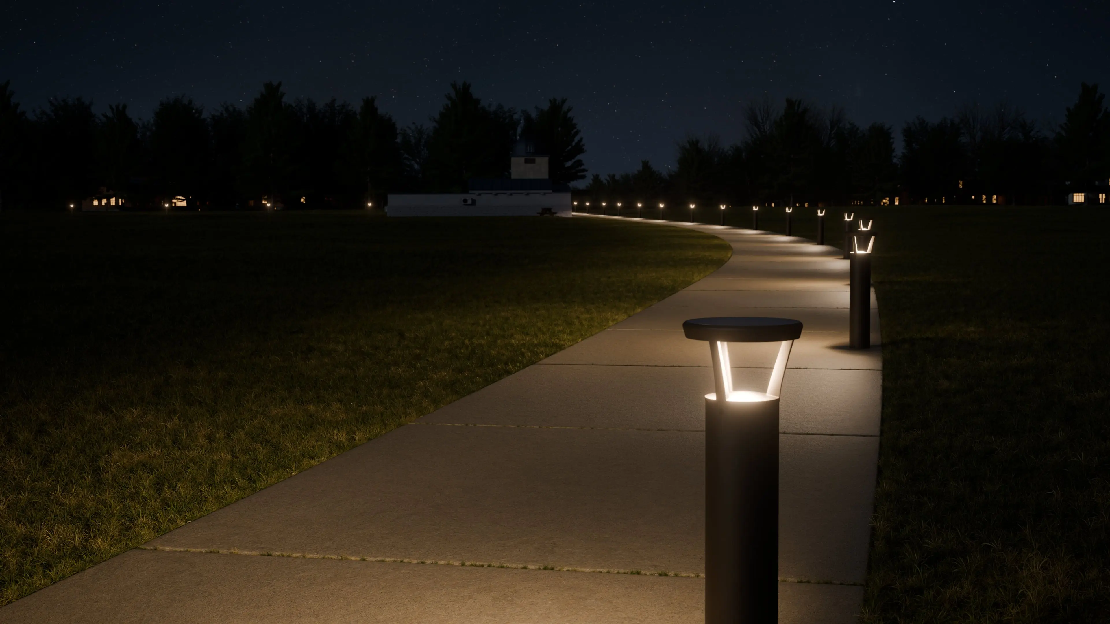 Curved concrete pathway illuminated by modern bollard lights at night, with a building and trees in the background under a starry sky.