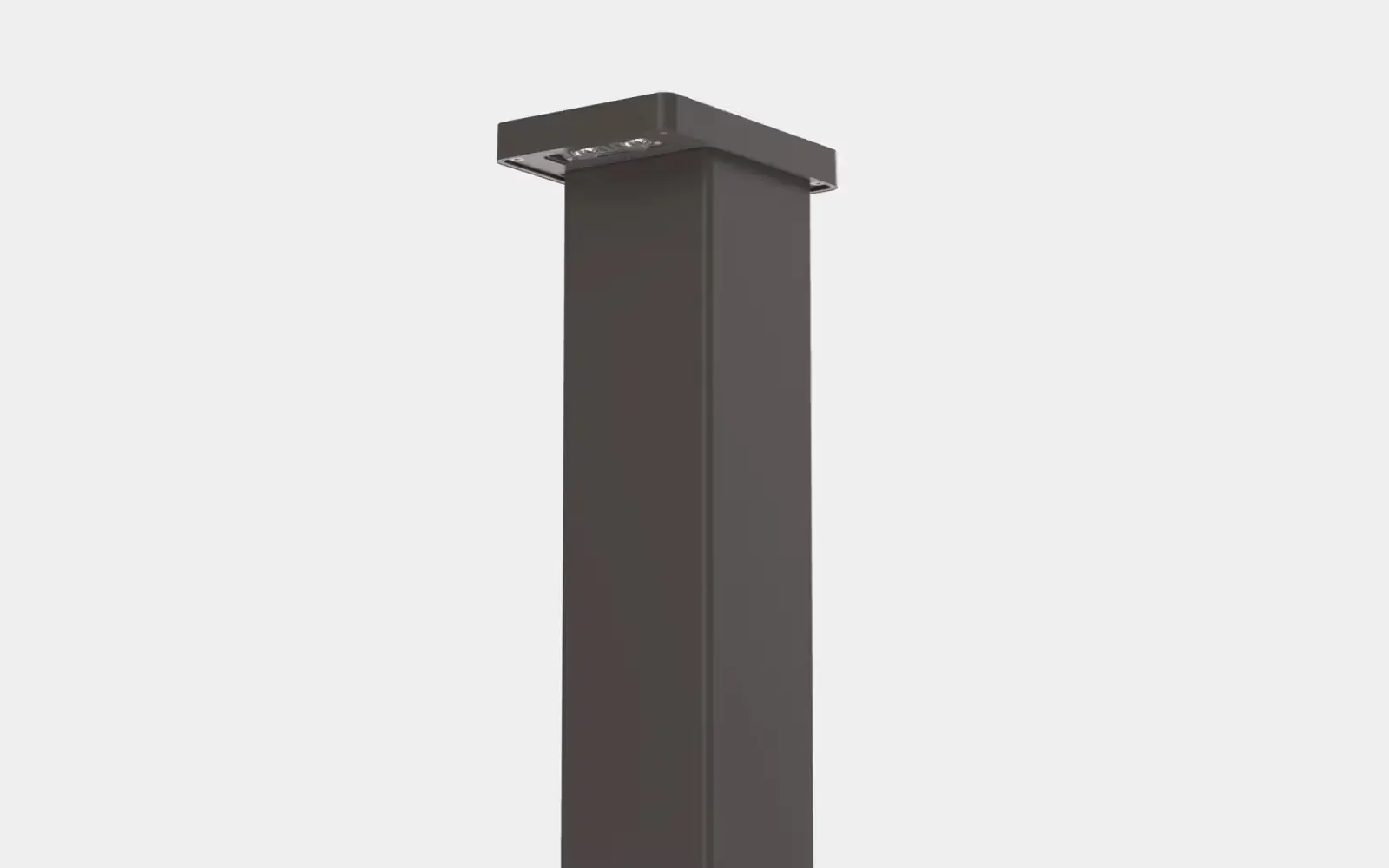 Tall rectangular bronze outdoor bollard light with multiple LED bulbs on the underside of the top section.