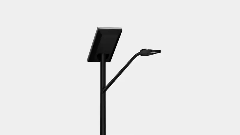 Modern black streetlight pole with a rectangular solar panel and a curved LED lamp head.