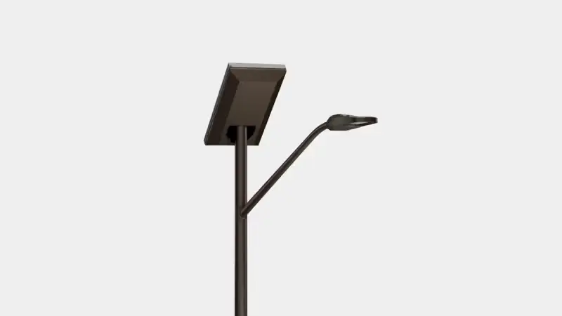 Modern black street lamp with a solar panel attached on a light gray background.