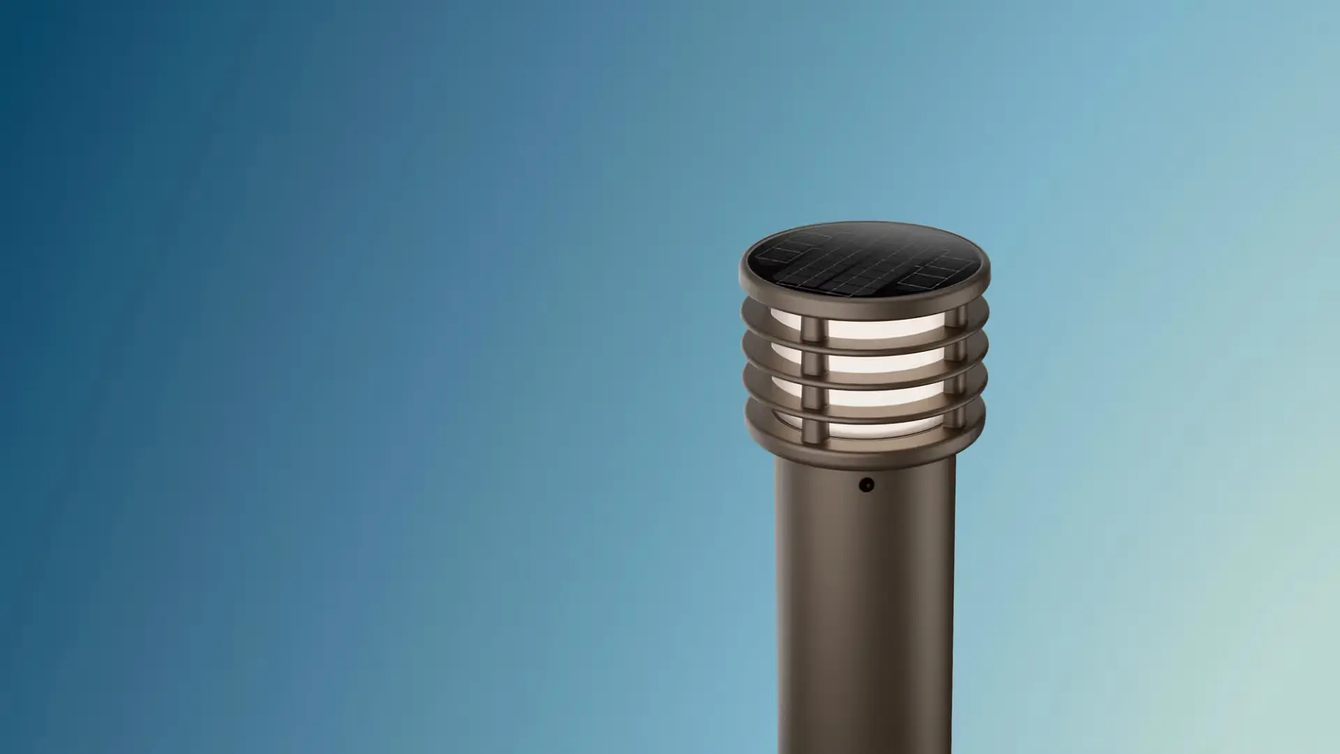 Modern outdoor solar-powered garden lamp with a cylindrical metal body and horizontal rings around the light.