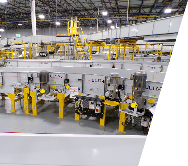 View of sorting conveyors on a fulfillment center floor.