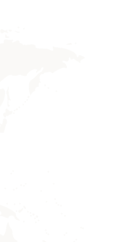 Abstract grayscale map showing parts of continents with scattered dots on a black background.