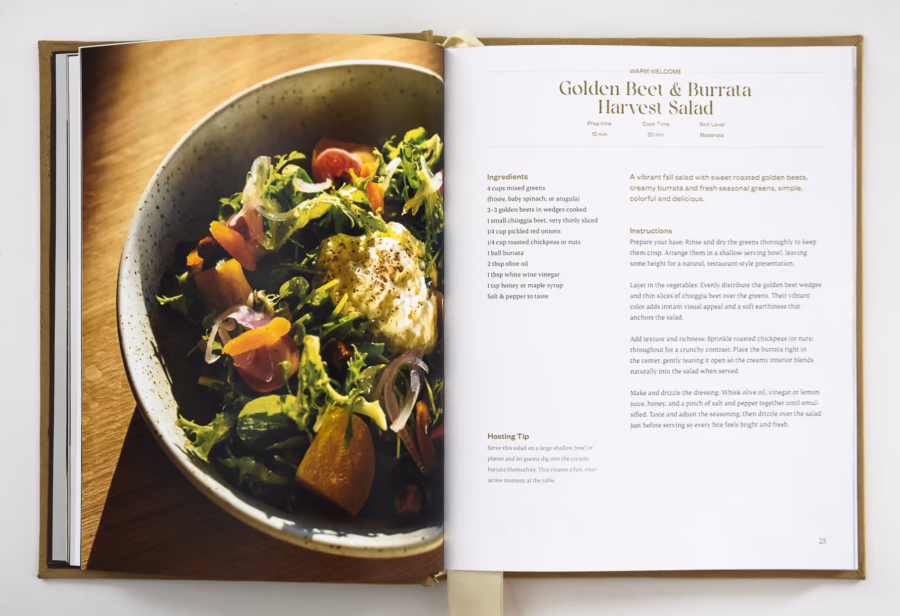 Open cookbook showing Golden Beet & Burrata Harvest Salad with ingredients and a salad photo. Credit: May-Lee Abel